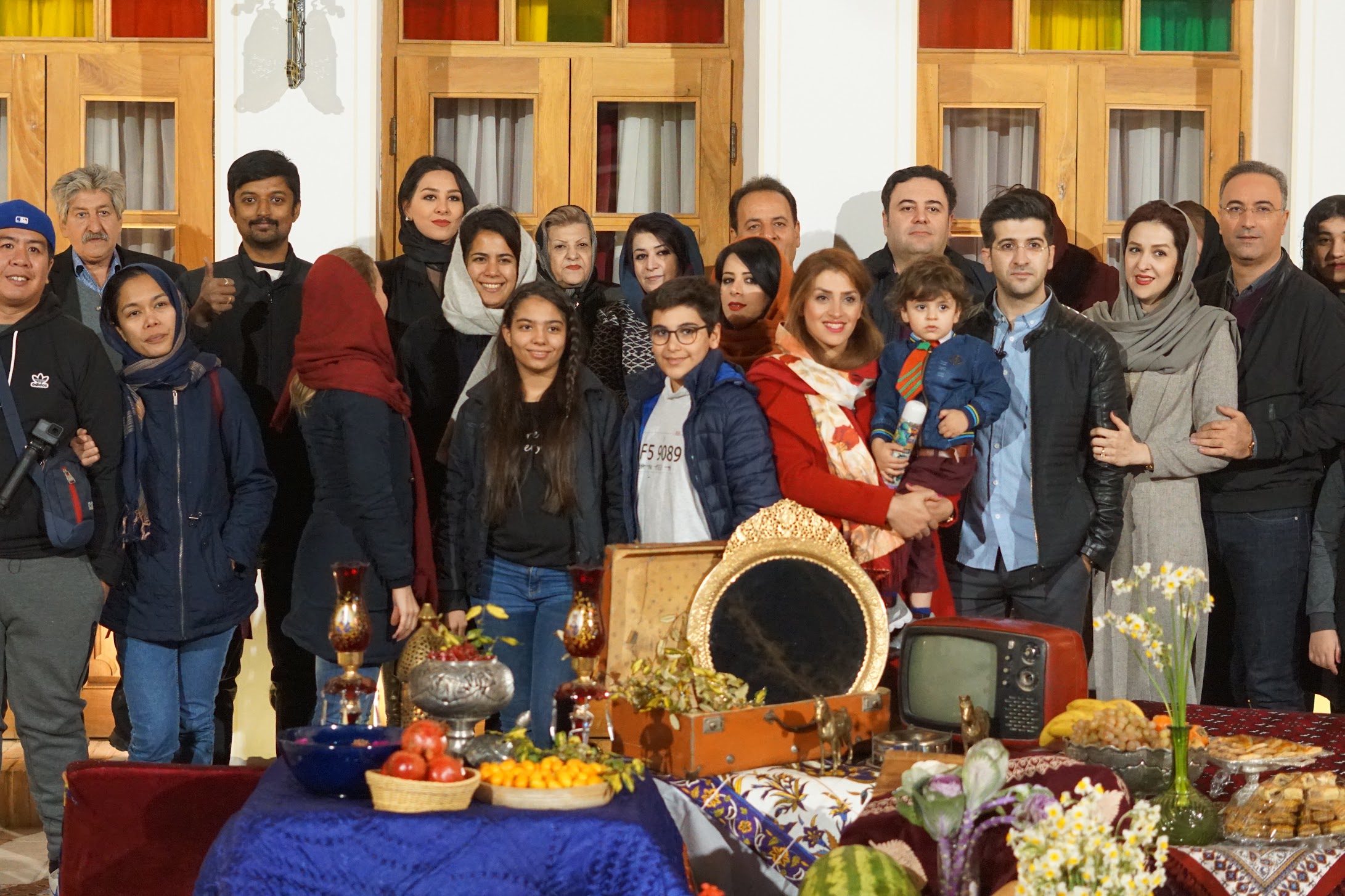 Vasanth connecting with a group of local families and travellers